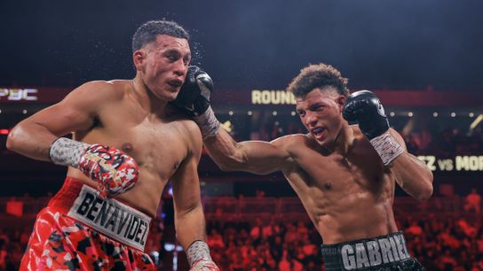 David Benavidez (L) and David Morrell Jr. battle during their light heavyweight title fight Saturday. David Benavidez (L) and David Morrell Jr. battle during their light heavyweight title fight Saturday.