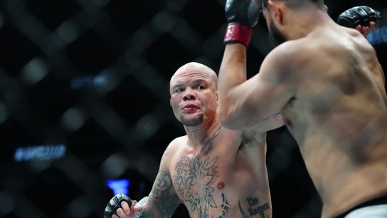 Anthony Smith's final walk: A Lionheart to the very end. Photo by Stephen R. Sylvanie/Imagn Images