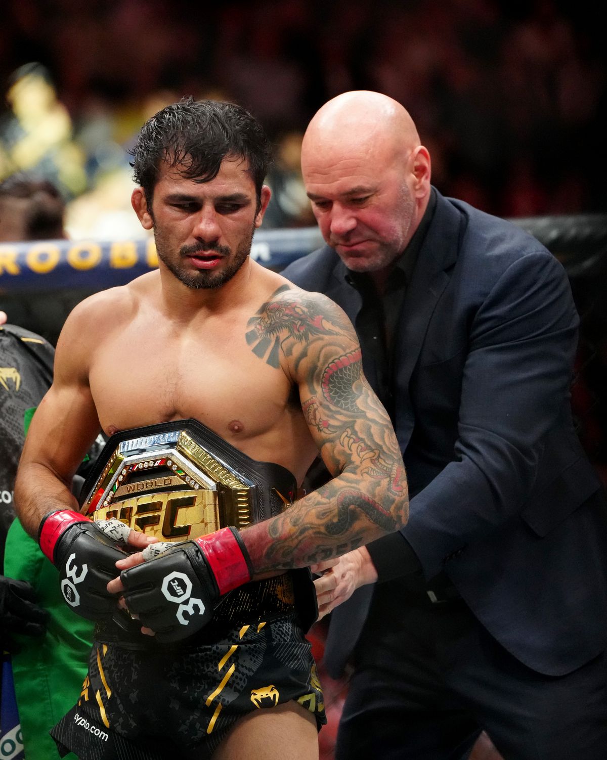 UFC CEO Dana White (R) wraps the belt on flyweight champion Alexandre Pantoja. UFC CEO Dana White (R) wraps the belt on flyweight champion Alexandre Pantoja.