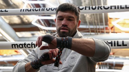 John Ryder wraps his hands as he prepares to face Jaime Munguia on Saturday in Phoenix. John Ryder wraps his hands as he prepares to face Jaime Munguia on Saturday in Phoenix.